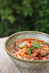 Tom Yum soup , a Thai traditional spicy prawn soup