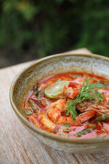 Tom Yum soup , a Thai traditional spicy prawn soup