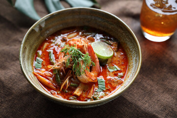 Tom Yum soup , a Thai traditional spicy prawn soup
