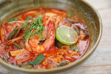 Tom Yum soup , a Thai traditional spicy prawn soup