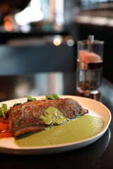 Sea bass fillet with pesto sauce