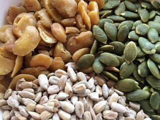 Close-up Healthy food, dried cereals, sunflower seeds, pumpkin seeds, pistachios.