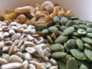 Close-up Healthy food, dried cereals, sunflower seeds, pumpkin seeds, pistachios.