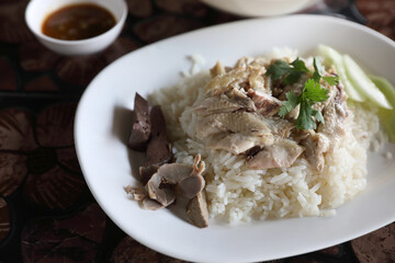 Thai food gourmet steamed chicken with rice in wood background
