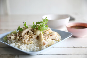 Thai food gourmet steamed chicken with rice in wood background