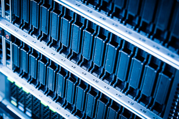 Fototapeta premium cluster of data storage SSD hard drives inside server rack