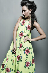 Fototapeta premium Fashion model in bright dress
