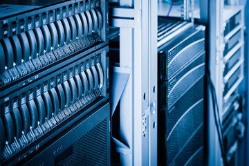 cluster of data storage SSD hard drives inside server rack