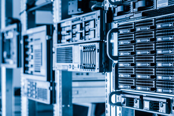 Cluster of data storage hard drives inside server room