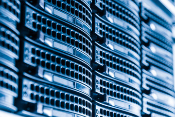 Cluster of data storage hard drives inside server room