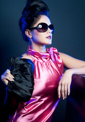 woman with fashion sunglasses and handbag