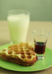 Delicious waffle with milk