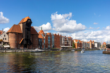 The largest medieval port Crane in Europe and historic buildings on the Dlugie Pobrzeze over the...