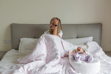 Tired Mother Suffering from experiencing postnatal depression. Health care mom motherhood...