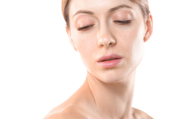 Beautiful female face with closed eyes and hair up, close up. Caucasian woman portrait with natural makeup, isolated on white.