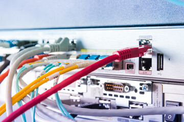 Fiber Optic cables connected to an optic ports