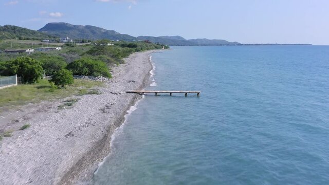 Aerial high speed forward along Palmar de Ocoa seashore, Dominican Republic