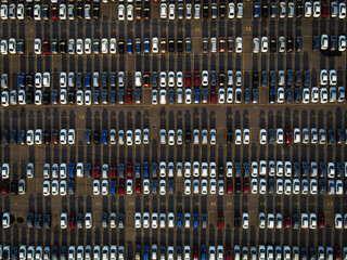 Top view of new cars in a parking lot ready for export or import
