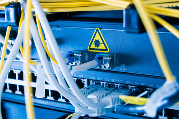 Server with patch and fiber optic cables plugged in ethernet por