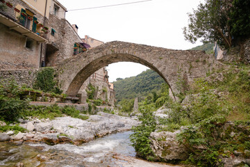 Zuccarello architectures and historical bridge, medieval town near Albenga, Liguria, Italy 