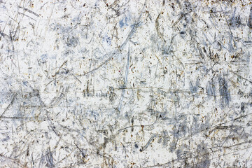 Scratched metal texture. Peeling paint background. White rusty brushed iron sheet. Cracked steel pattern. Industrial backdrop for graphic design.