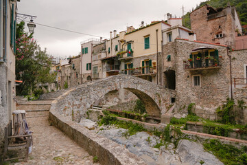 Zuccarello architectures and historical bridge, medieval town near Albenga, Liguria, Italy 