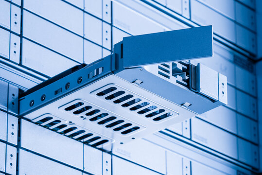 hard drive repair concept - hard disk inside tray is pulled out