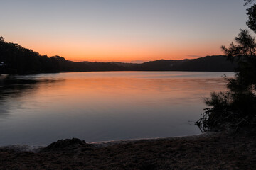 Fototapeta na wymiar Sunset over the Lagoon with Clear Skies