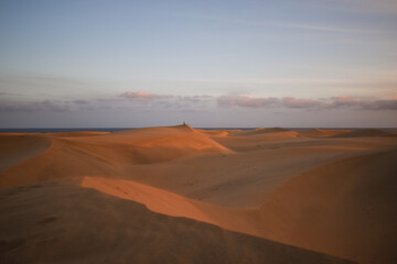 Fototapeta na wymiar Sand dunes photographed at sunset in the Maspalomas desert in Gran Canaria.