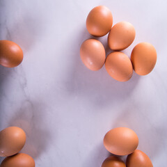 Close-up of fresh brown eggs ,top view,copy space,background,