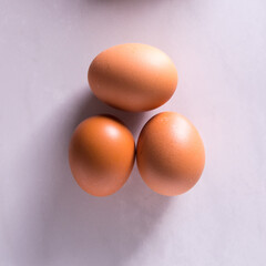 Close-up of fresh brown eggs ,top view,copy space,background,