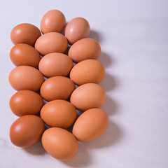 Close-up of fresh brown eggs ,copy space,background,advertising