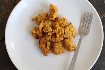 Crispy Corn Tikki, pakora/pakoda or pattice also known as cutlet.