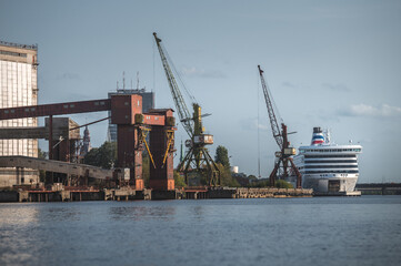 Fototapeta na wymiar Riga, Latvia 09.15.2020. Photoshoot of Riga terminal. Industrial environment, cargo ships, container cranes. Urban landscape. 