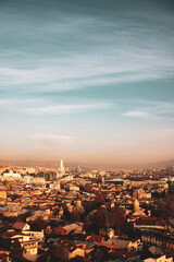 Fototapeta na wymiar Sunrise over the city (Tbilisi, Georgia)