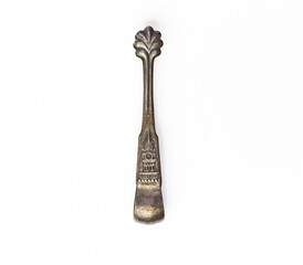 Vintage soviet sugar tongs with the image of the kremlin and the inscription Moscow isolated on a white background