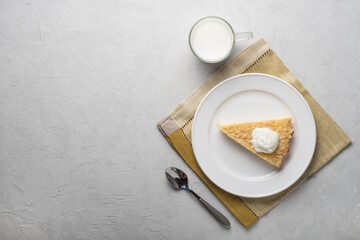 Healthy breakfast made from soft cottage cheese casserole , served with sour cream and  milk.