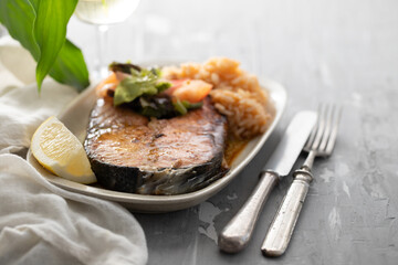 fried salmon with shrimps on white dish