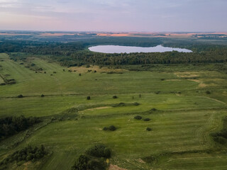 lake in the middle of the forest beautiful nature trees clouds reflection