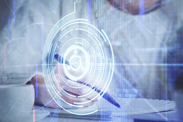 Multi exposure of writing hands on background with data solution hologram. Technology concept.