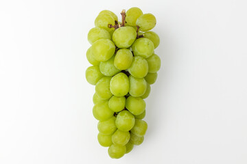 Green grapes on white background