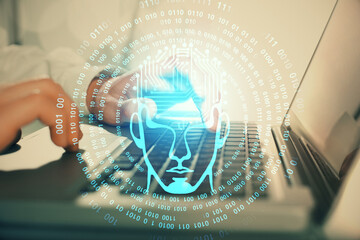 Man typing on keyboard background with brain hologram. Concept of big Data.