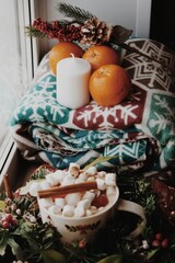 Christmas table setting. Christmas food. A cup of hot coffee with marshmallow.