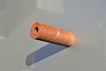 Rusted steel mile and hexagonal nut. Rusted metal exposed to corrosion with thread screw and...
