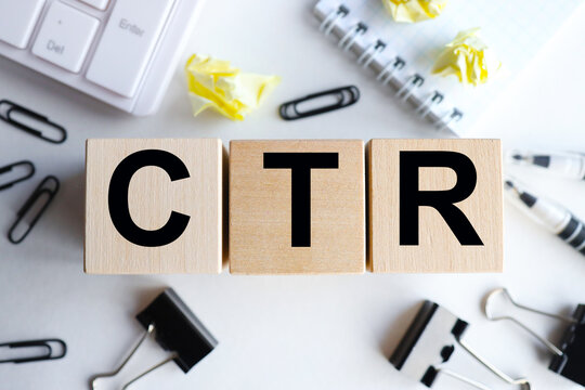 CTR, text on wood cubes on a light background