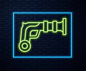 Glowing neon line Vintage pistols icon isolated on brick wall background. Ancient weapon. Vector.