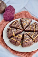 Purple sweet potato scones with peanut butter and pumpkin seed butter 