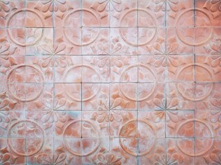 Fototapeta na wymiar Pattern and Background : Decorative brick, orange tone colour terracotta tiles wall 
