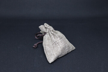 a small pouch of woven fabric