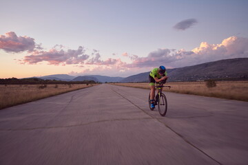 triathlon athlete riding a bike
